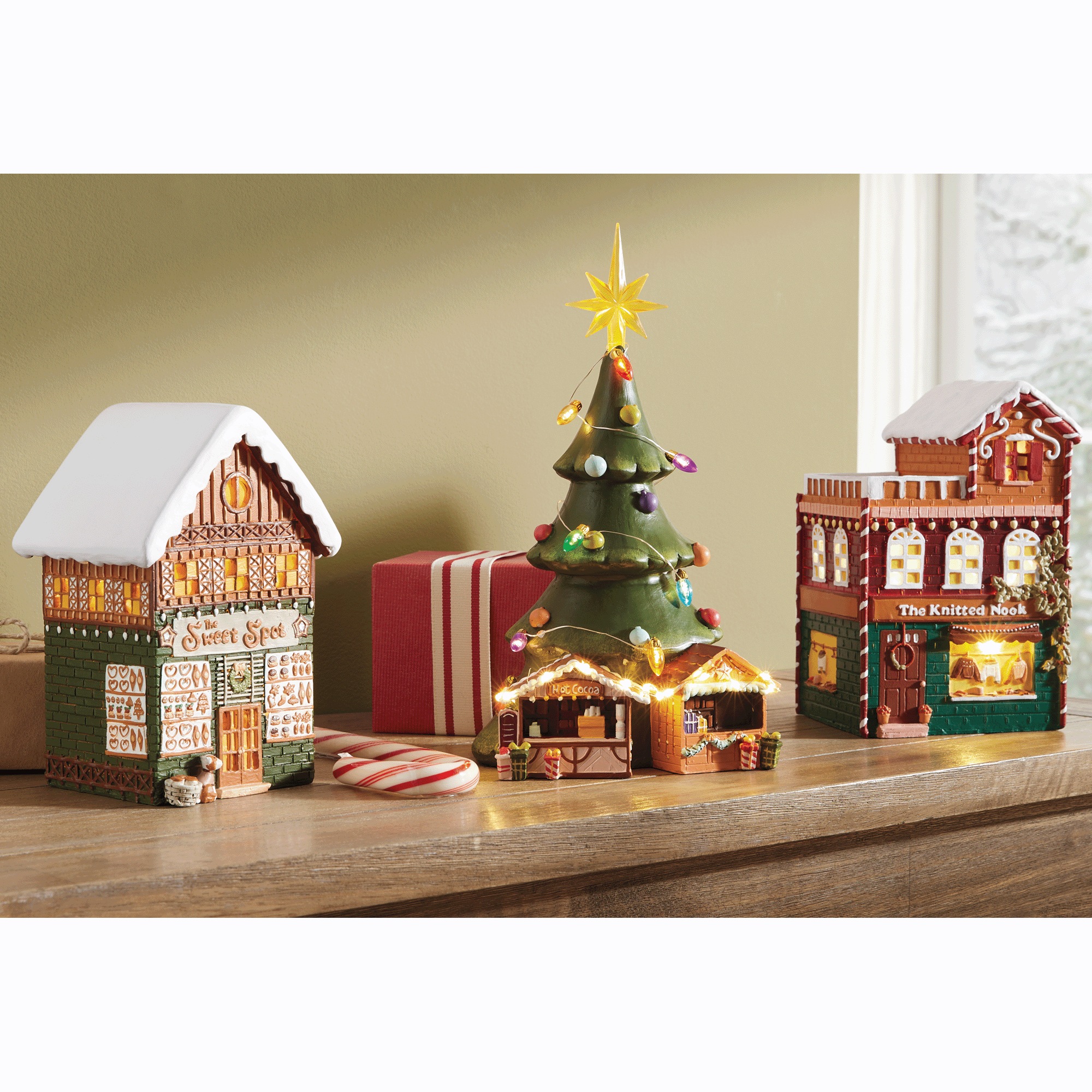 Lit Snowy Village Buildings