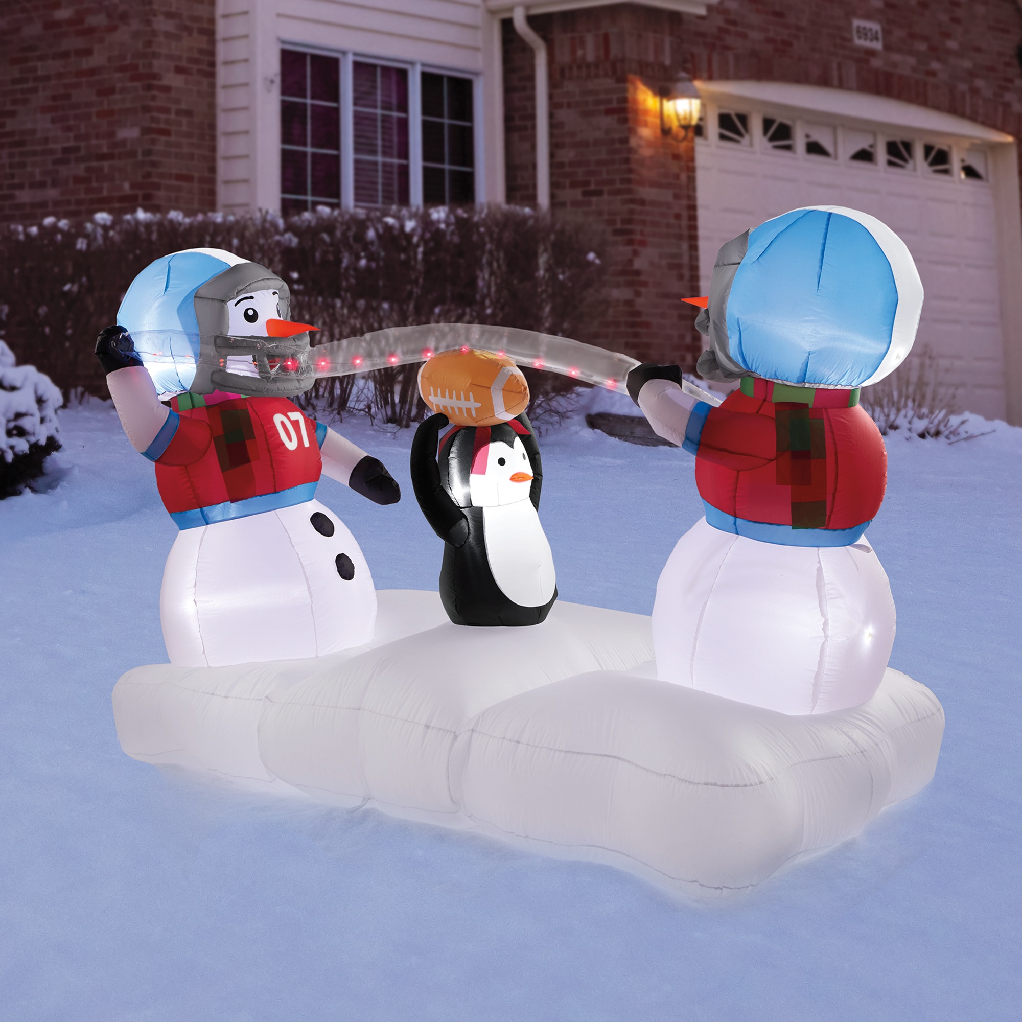 Lit Snowmen Playing Football Inflatable